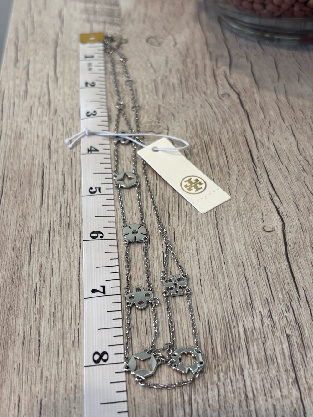 Tory Burch Silver Double Strand Floral & Geometric Charm Necklace - Picture 4 of 4
